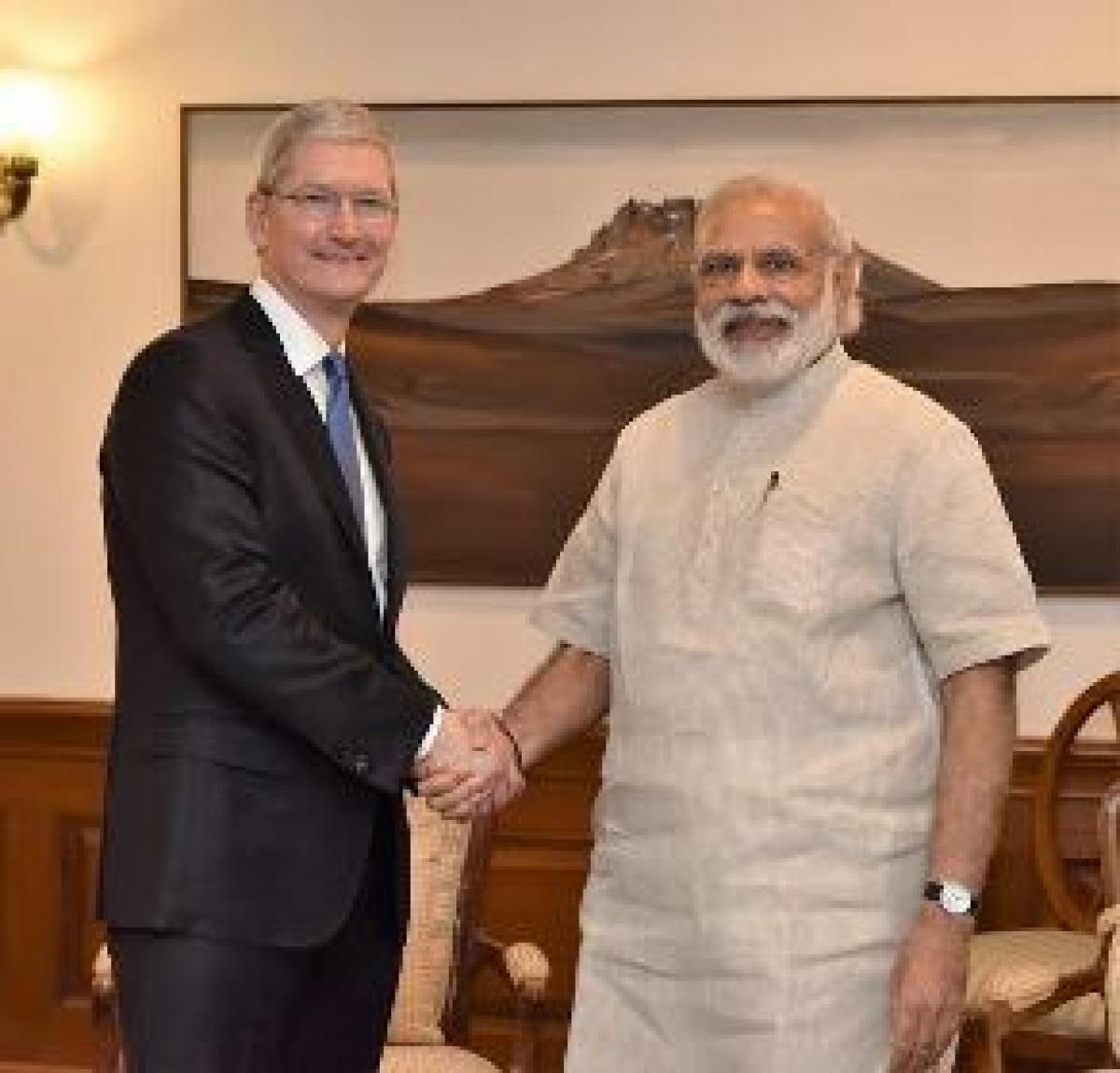 Tim Cook meets PM Modi, updates Narendra Modi mobile app